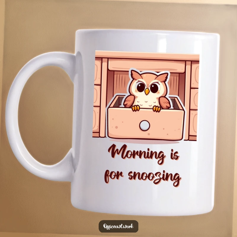 Funny mug depicting a peaceful owl snuggled contentedly inside a stylized, cozy desk drawer.