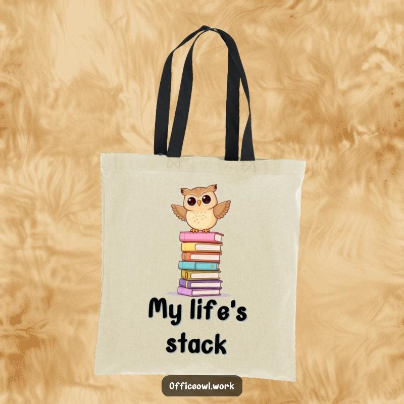 Funny tote bag with an illustration of a playful owl wobbling on a tall stack of pastel folders.